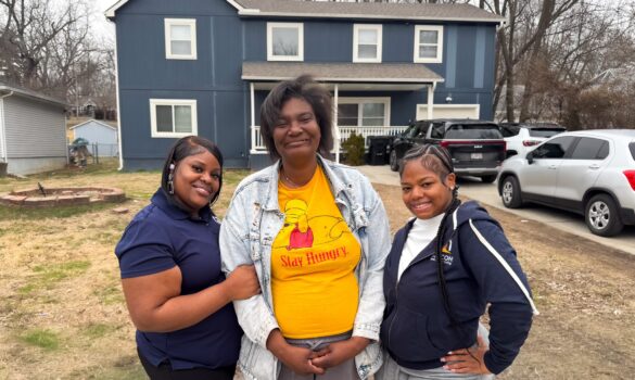 Staff and Individuals MO 2.16.26-45 (1) Three women standing in front of a blue house.