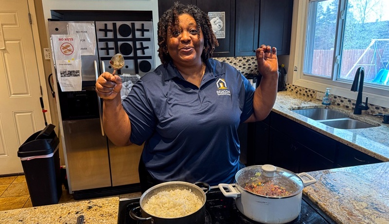 Food MN-16-2 Woman cooking a meal in the kitchen.